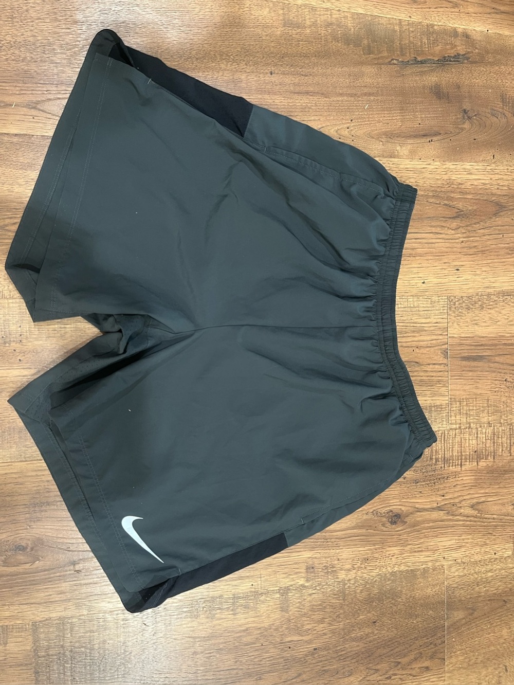 Nike men’s charcoal black Athletic Running Shorts.